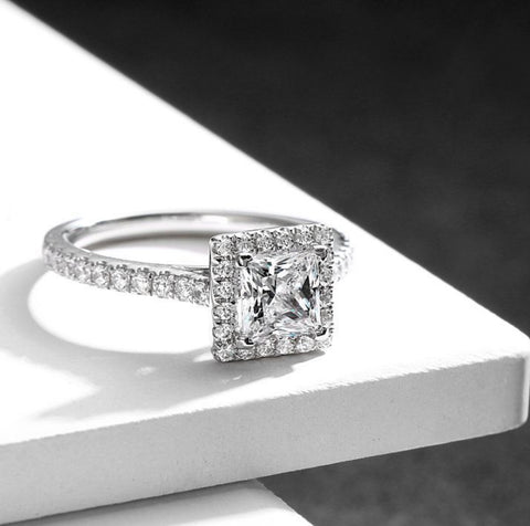 a princess cut diamond halo engagment ring