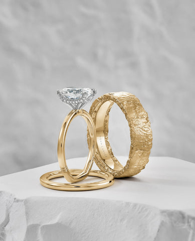 a yellow gold engagement ring with a hidden halo