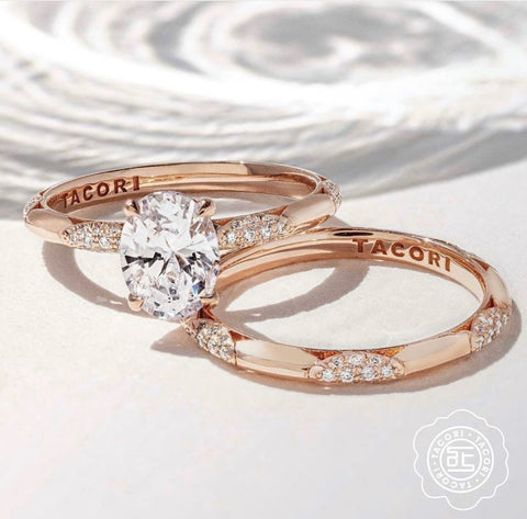 a rose gold diamond engagement ring with a matching wedding band
