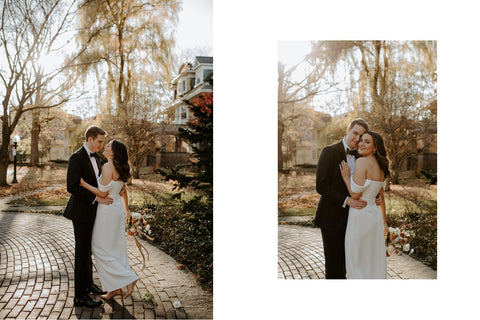 Married couple posing for wedding pictures outside