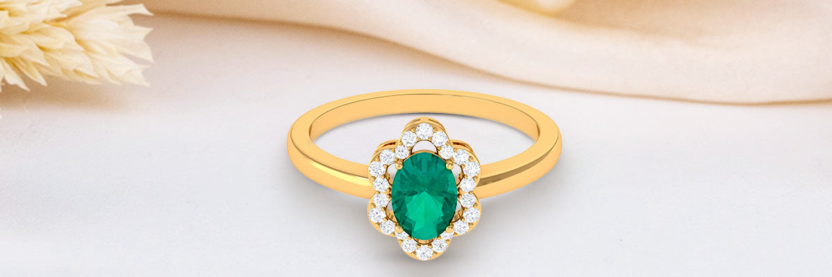 Oval Emerald Floral Halo Engagement Ring