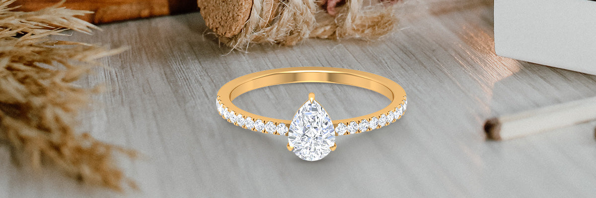 French Pave Set Pear Cut Moissanite Ring