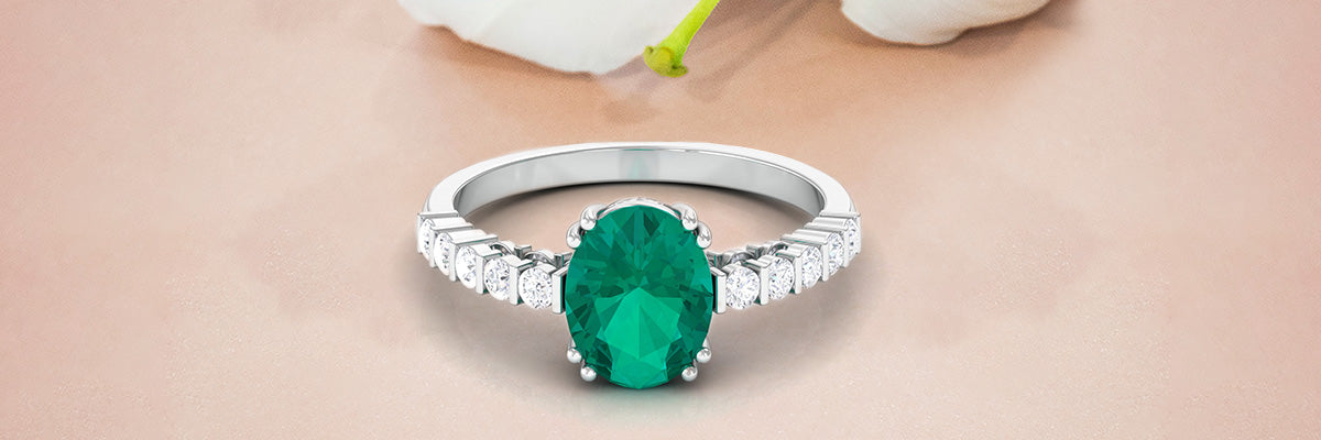 Oval Cut Emerald Solitaire Engagement Ring