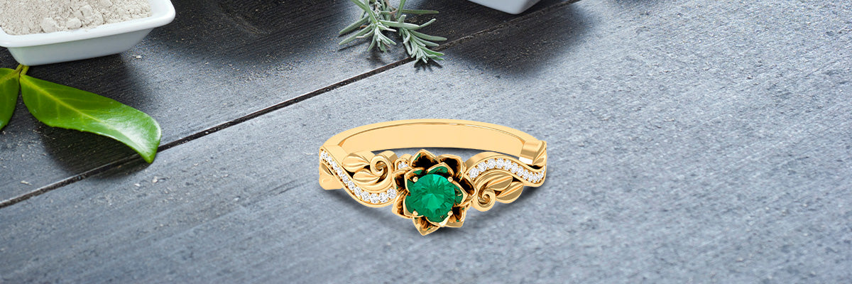 Opt Blooming Beauty: Flower Inspired Emerald and Diamond Engagement Ring in Gold