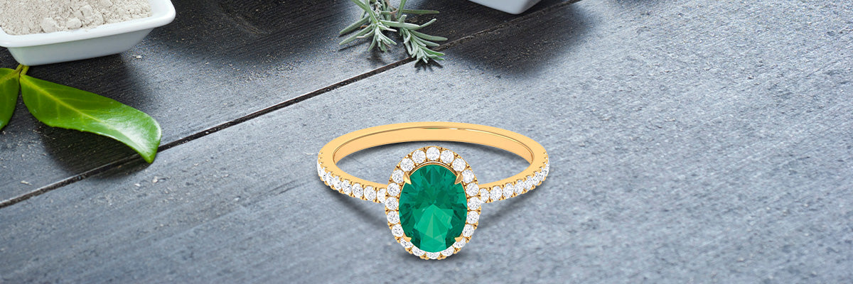 Go Green: Emerald Cocktail Engagement Ring with Diamond Accent