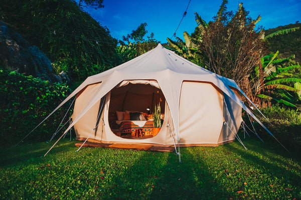 Camping tent on summer lawn
