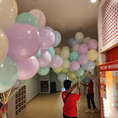 Lots of Macaron Coloured Helium Balloons delivered for a great event.