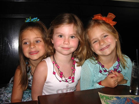 Gabrielle, Kate, and Madeleine as children