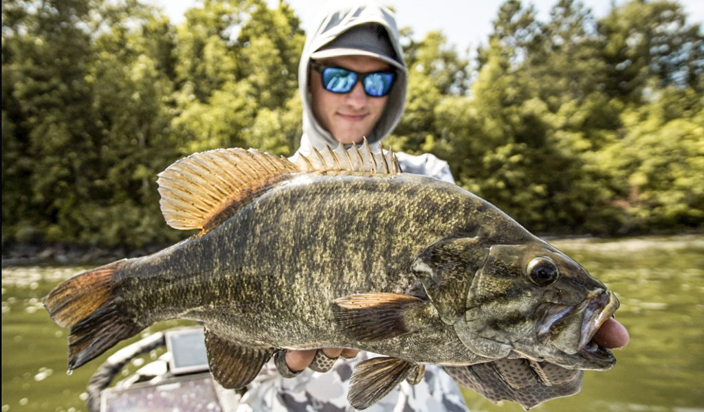 Easton Fothergill with a giant MN smallmouth