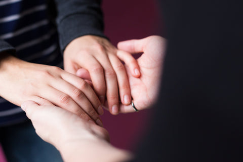 Feminine Hand Holding