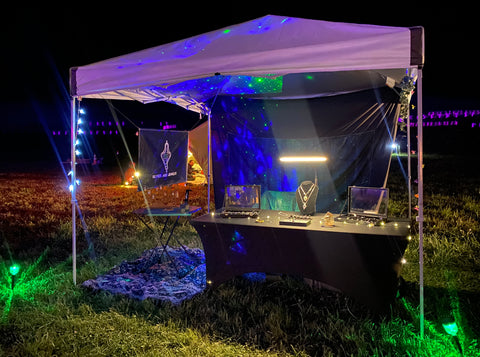 Silver Age Jewelry booth at night at Ohm On The Range festival in Washington 2023