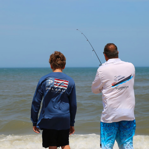 Angler wearing dri-fit custom boat shirt