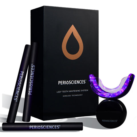 Black box of PerioSciences LED Teeth Whitening Kit with Wireless LED² Light Device that fits into the mouth and three Teeth Whitening Pens.