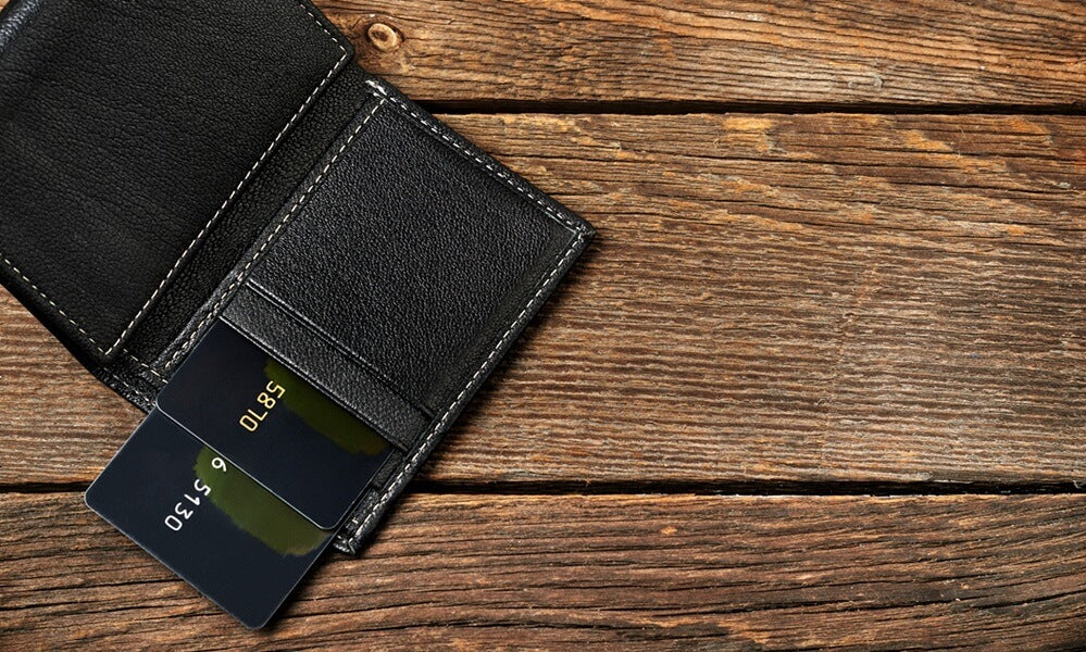 black wallet with cards