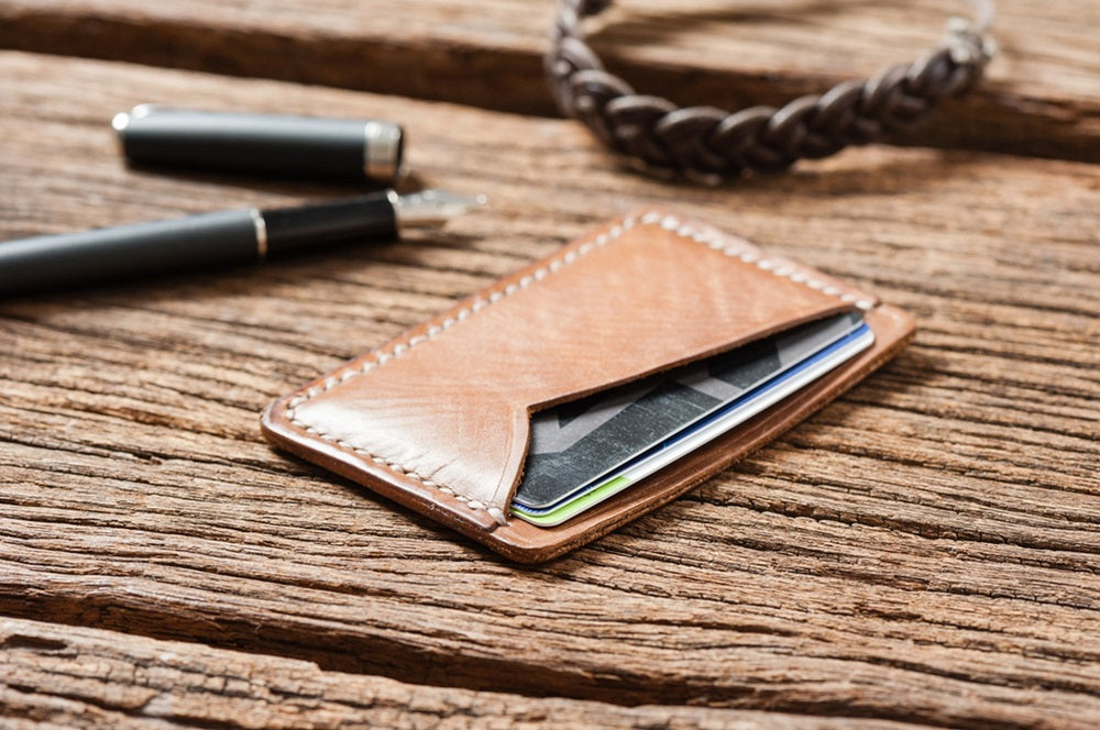 slim wallet on table