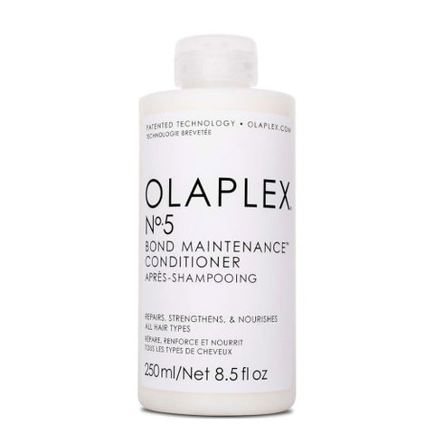 L'après-shampoing Bond Maintenance N°5 Olaplex aide à restaurer les liaisons capillaires sans alourdir la chevelure. Formulé avec la technologie brevetée reconstructrice Olaplex, il répare, hydrate et démêle les cheveux sans les alourdir. Il élimine les frisottis, soigne les cheveux abîmés et permet de retrouver des cheveux forts, sains et brillants, particulièrement après des traitements de coloration ou décoloration.