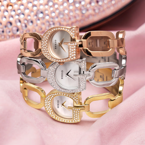 silver, gold and rose gold watches with G logo shaped case