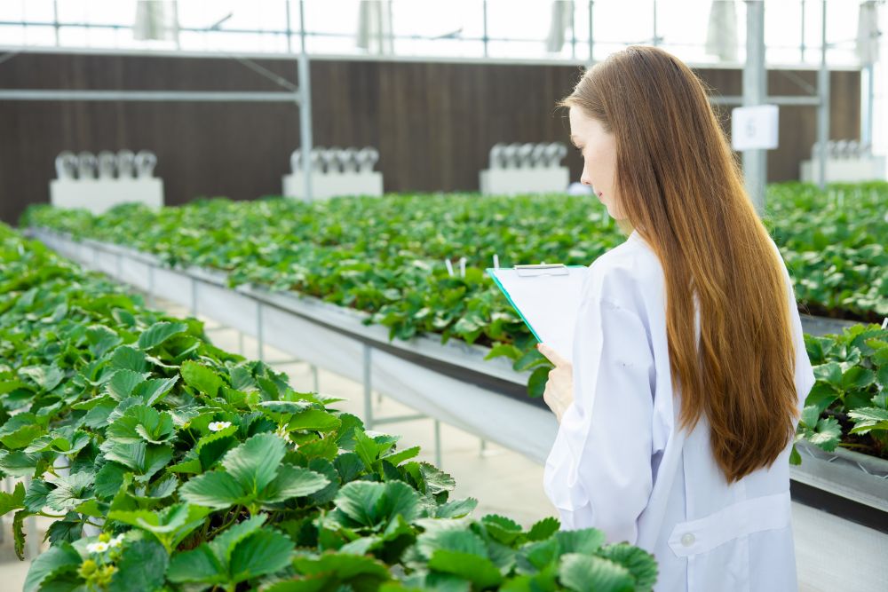 woman scientist with plants