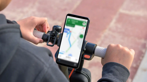 Mobile phone on a phone mount electric scooter accessory