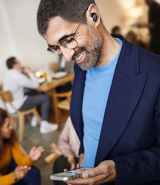 Sennheiser Conversation Clear Plus hearing solution connected to mobile