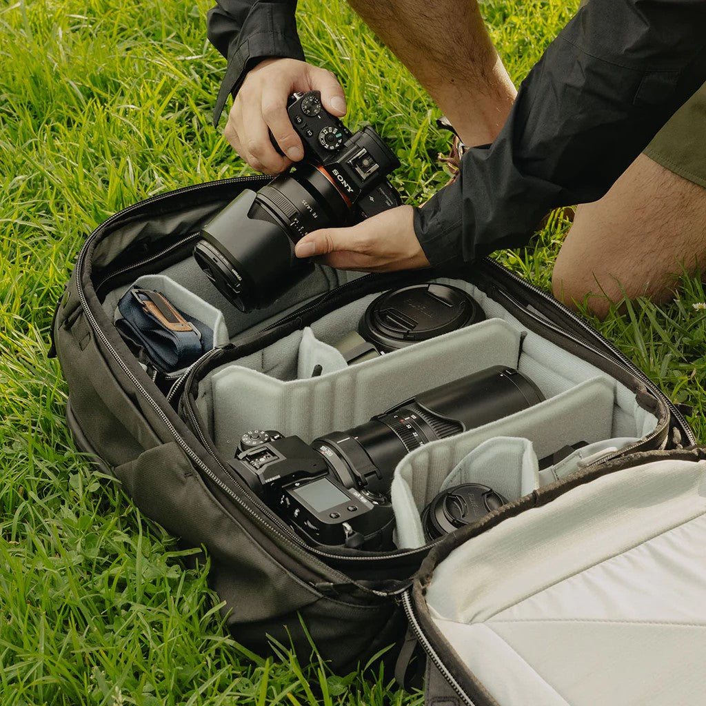 A man packing Sony camera in Peak design Camera Cube V2 Size Large