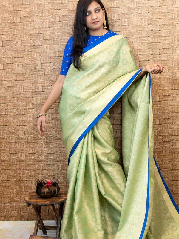 Banarasee Kora Muslin Saree With Floral Tanchoi Design & Skirt Border-