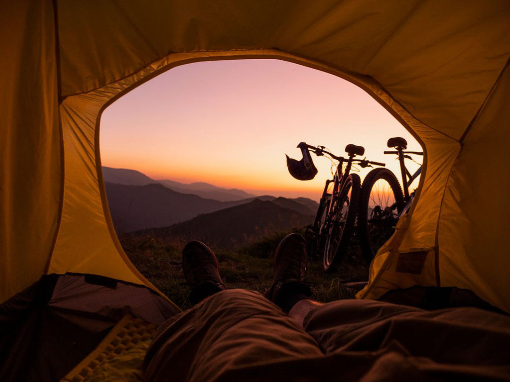 Bikes parked next to a camping tent