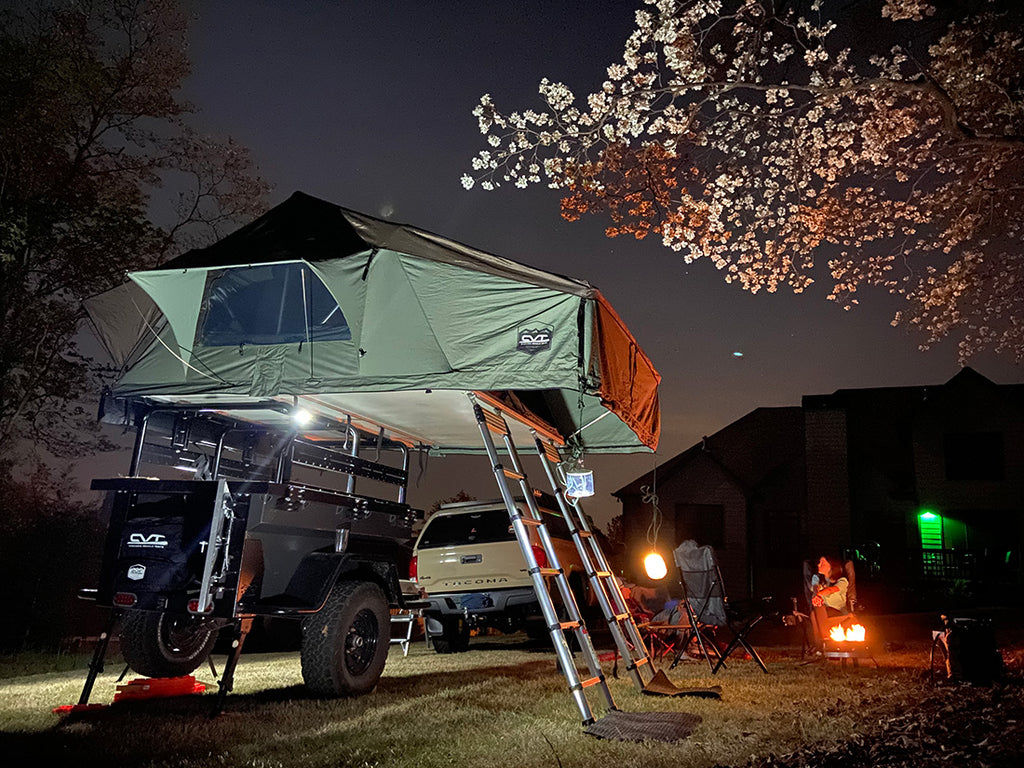 Car camping site at night