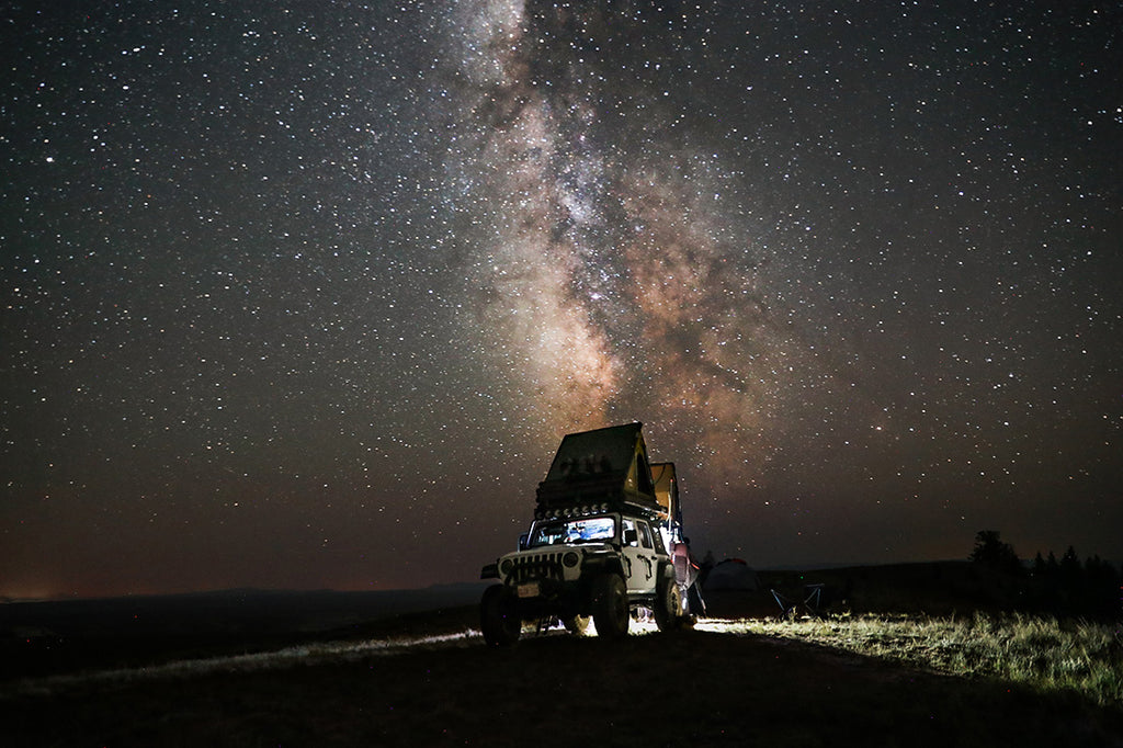 Car camping on a starry night