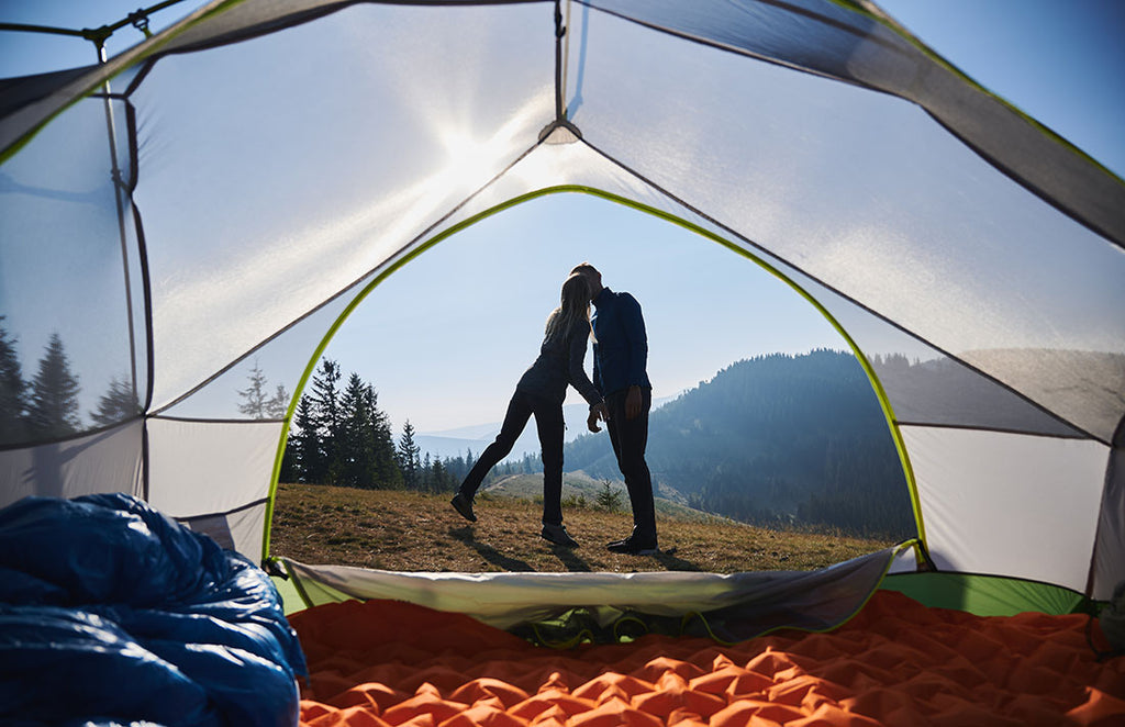 A quick kiss outside the tent