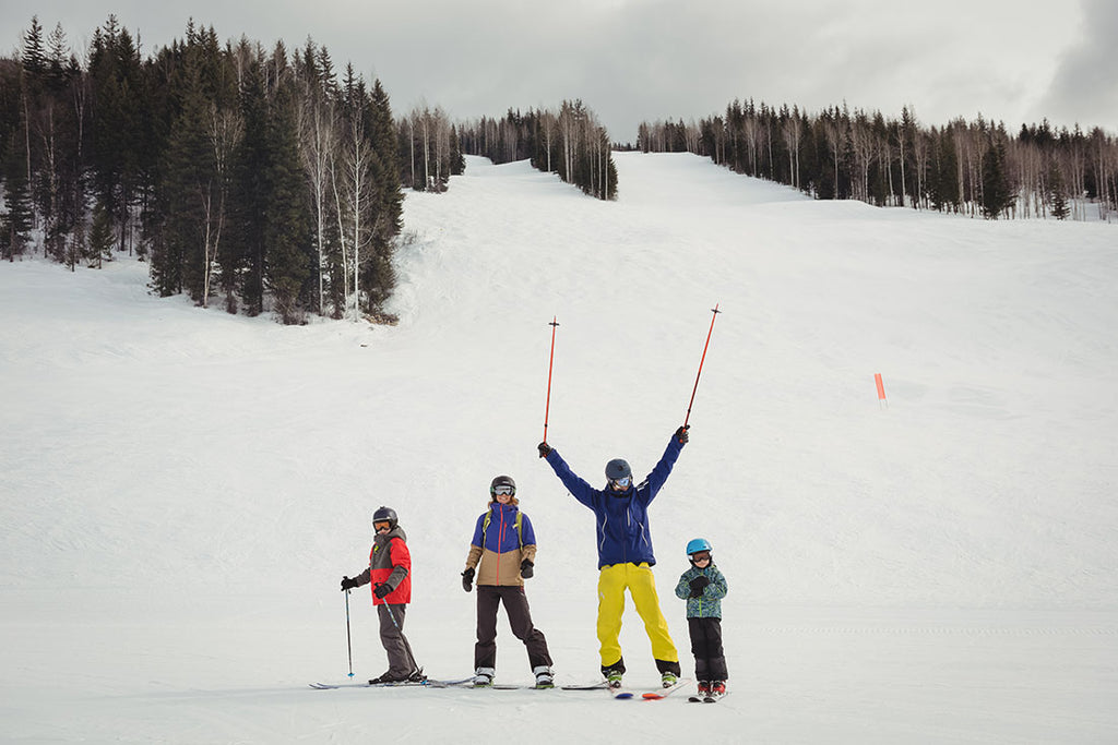 Family having fun skiing in Utah
