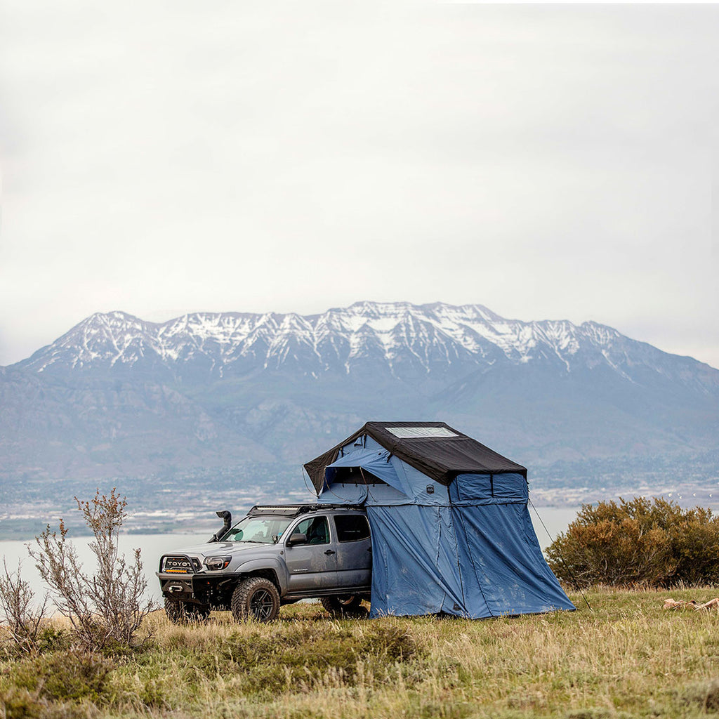 Car camping in winter with a rooftop tent