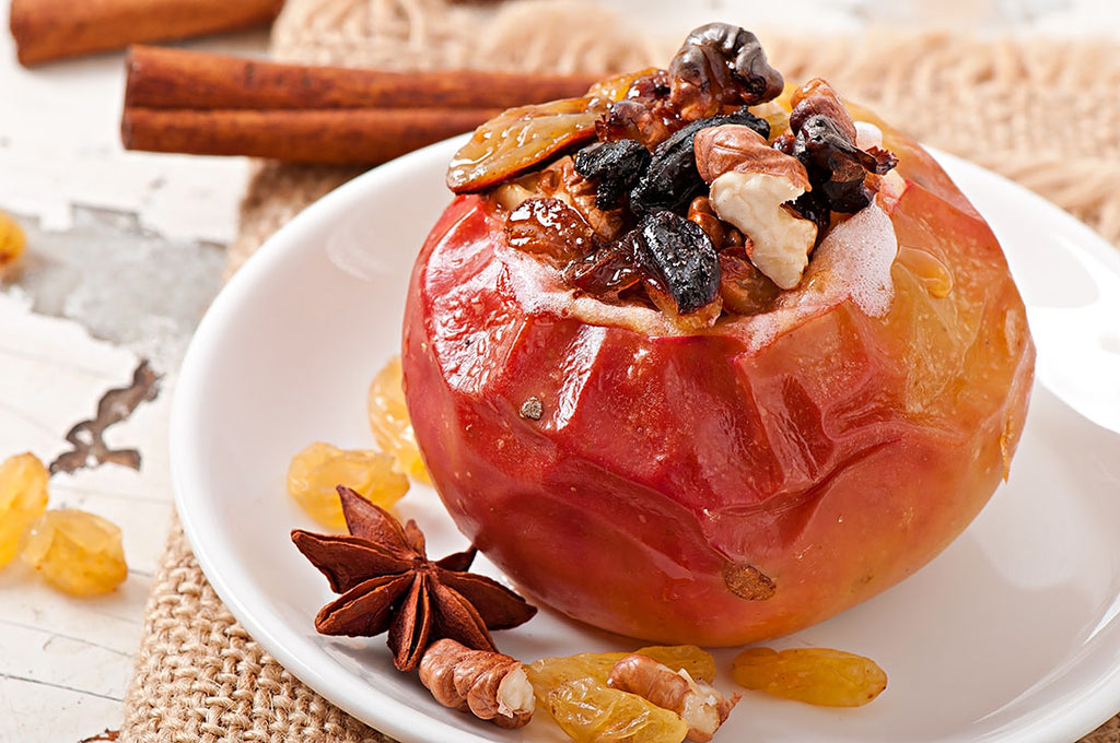 Roasted apple stuffed with raisins and nuts