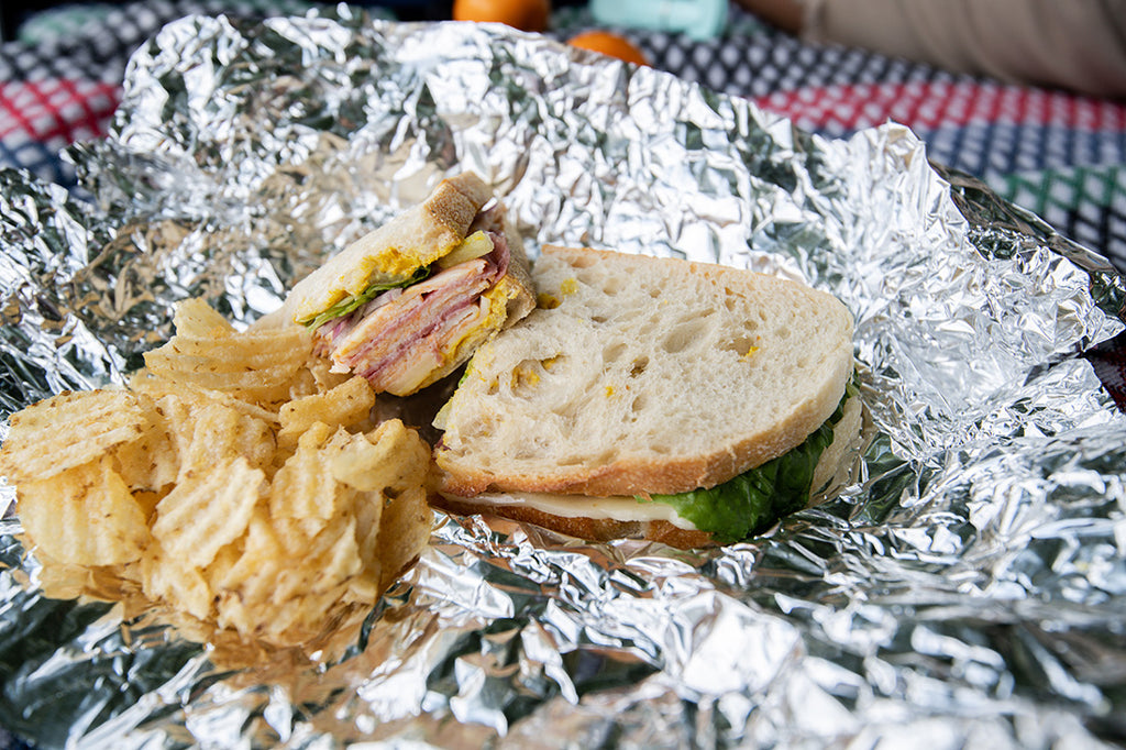 Sandwich with garnish on foil