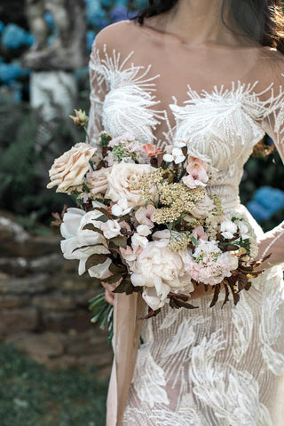 Villa Evalina in Lake Como, Italy bride close up of her lush bouquet