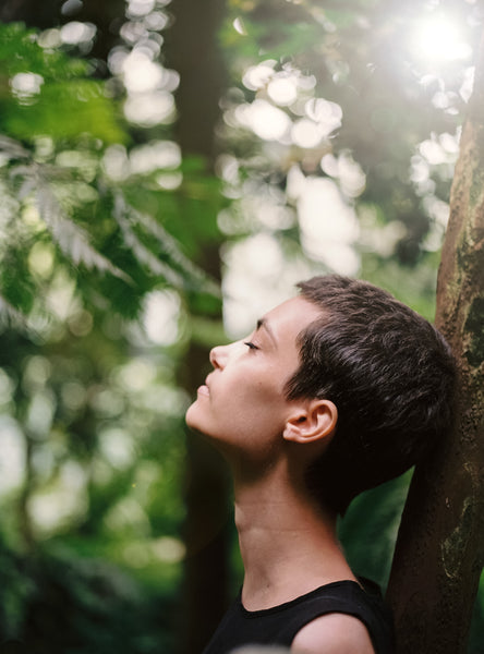 Woman looking at the sky in meditation.