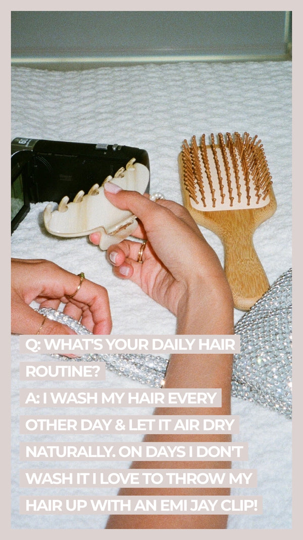 Q What's your daily hair routine? A I wash my hair every other day & let it air dry naturally. On days I don't wash it I love to throw my hair up with an Emi Jay clip!