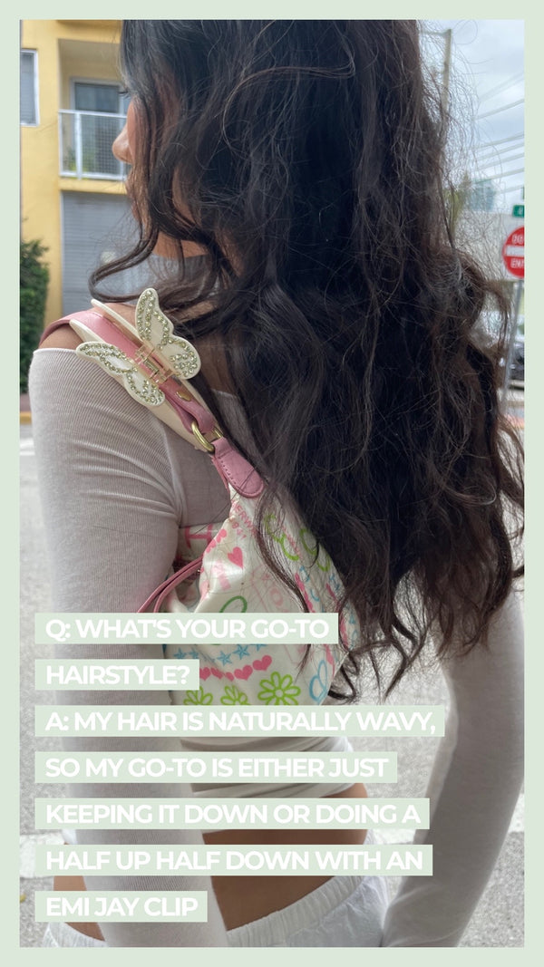 Q: What's your go-to hairstyle? A: My hair is naturally wavy, so my go-to is either just keeping it down or doing a half up half down with an Emi Jay Clip