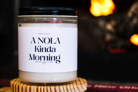 A NOLA Kinda Morning candle with a lid