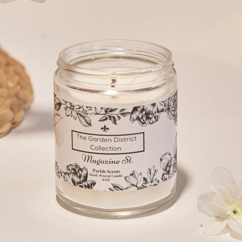 Magazine Street New Orleans - a Candle by Parish Scents in a glass jar candle vessel with a floral label