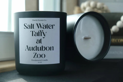 Salt Water Taffy at Audubon Zoo Candle by Parish Scents in a black glass candle vessel