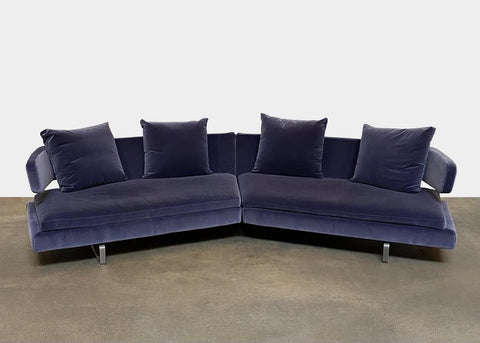 This beautiful dark blue sofa is made of only the finest materials around and can last you for years.