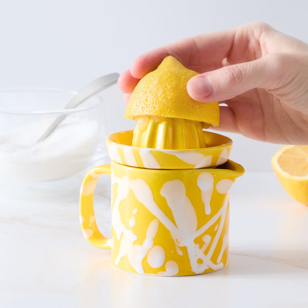 Art and Cook yellow and white ceramic juicer 