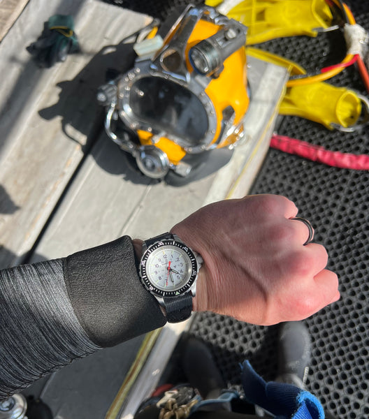 navy diver wearing marathon gsar arctic deepsea edc brock stevens
