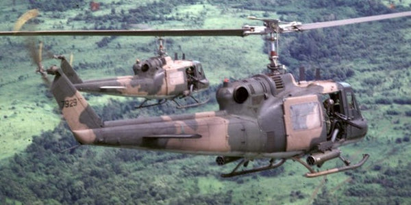 U.S. Air Force Bell UH-1 helicopters fly into Cambodia