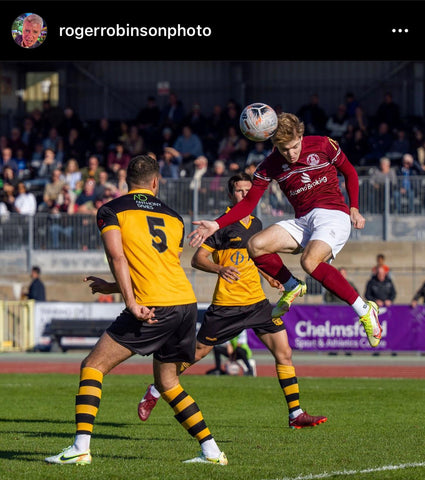 Tom Blackwell (Chelmsford City FC) headers the ball for Chelmsford City FC