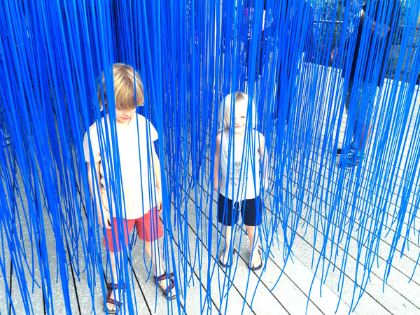 long blue string art installations that you can run through