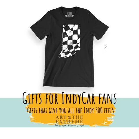 black t-shirt with the shape of Indiana in the middle. Indiana is created in a black and white checkered pattern.