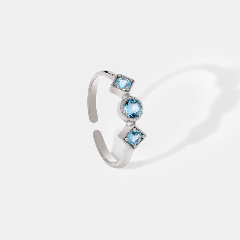 Sleek Blue Topaz Silver Ring