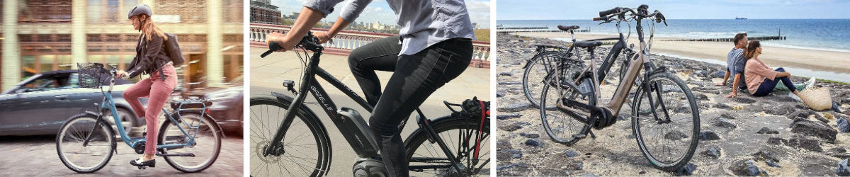 Frau sitzt auf einem City E-Bike der Marke Raleigh und fährt über die Straßen der Stadt